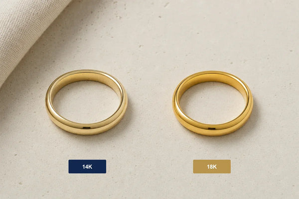 14K and 18K gold rings side by side showing color difference